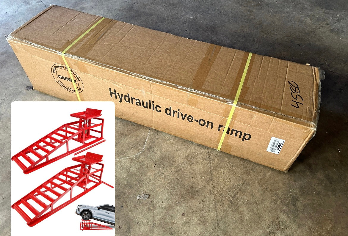 Hydraulic car ramps packaging box with 2-pack heavy-duty red car ramps.